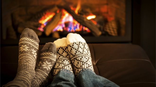 When I google for "hygge" images this is the first that comes up. I will admit that at times when my feet were frozen, while wearing wool socks and there was a fireplace handy, I have thawed out in this manner. It's hardly an everyday occurrence though, and there were no offers of mulled wine or artisan baked goods.